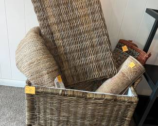 Heavy wicker basket w/ lid and some small rugs