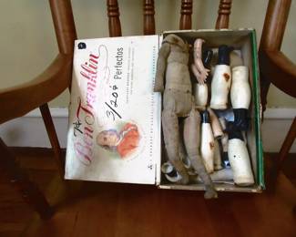 Box of vintage doll parts