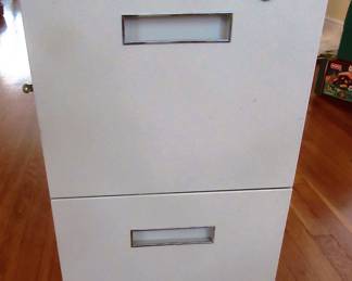 Two drawer metal filing cabinet on wheels.