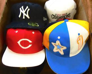 Full box of collectible new baseball caps. Some with official seal and tags. Sold separate.
