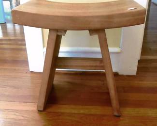 20-inch-high stool made from recycled wood, this little guy is heavy.