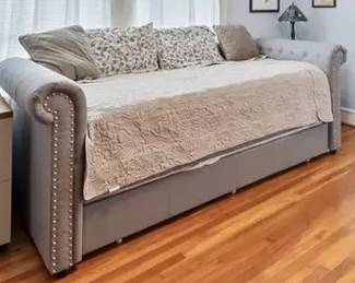 Trundle bed needs new mattresses.