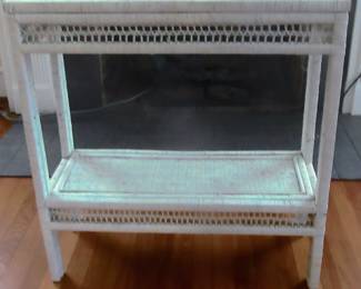 Wicker entry or sofa back stand.