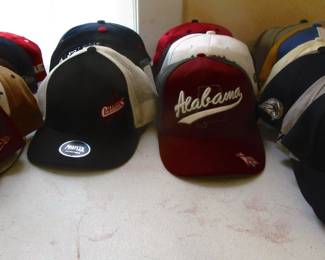Large assortment of baseball caps and Military caps. All new.