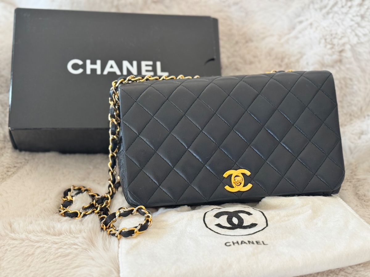 Chanel black full flap leather crossbody bag.
Authentication verified.
