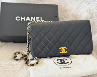Chanel black full flap leather crossbody bag.
Authentication verified.