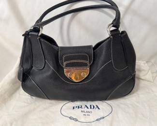 Prada black leather handbag. Dust bag included.