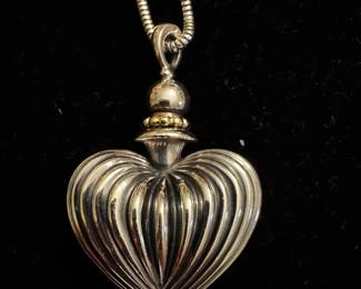 Lagos perfume pendant on a chain