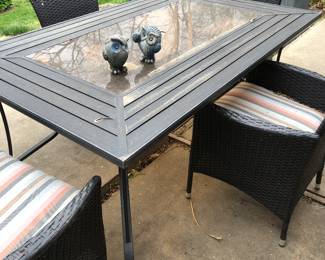 Three different outdoor tables and chairs