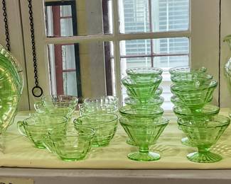 Uranium glass pitcher, plates, cups and sherbert cups. Juice glasses, block optic