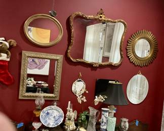 Mirror, oil lamps, vases