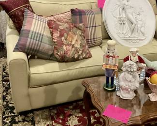 Nice sofa, throw pillows, Christmas items