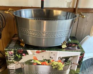 Stainless steel tub w brass feet