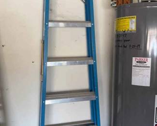 A Werner 8 Foot Fiberglass Step Ladder