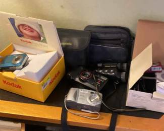 Kodak Cameras, Polaroid Camera, Binoculars, And More