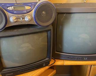 Magnavox And A Toshiba TVs And A Sharp Radio