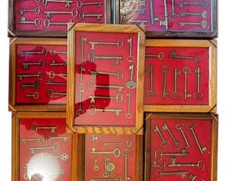 010 Eight Wooden Shadow Boxes of Brass Skeleton Keys