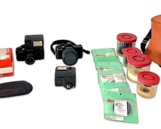 2 Pentax Auto 110 Cameras with Accessories