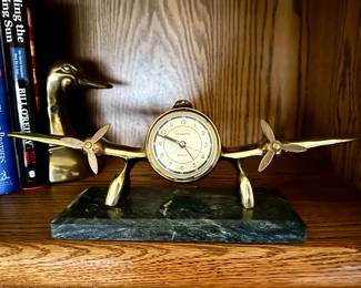 1983 brass propeller airplane clock on marble base. Made in Art Deco style by SARSAPARILLA DECO DESIGNS. Fine working condition.
