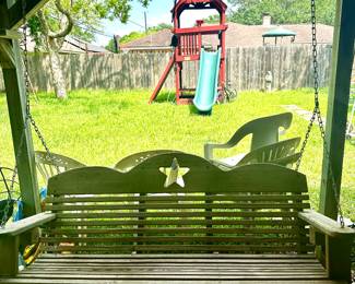 Wooden porch swing