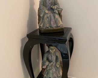 Black lacquer tall side table and porcelain Asian temple figurines