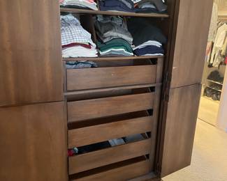 Inside the tall chest of drawers by Drexel