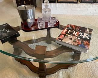 Oval glass-top coffee table, inlay box, crystal decanter and glasses and the the LOOK book