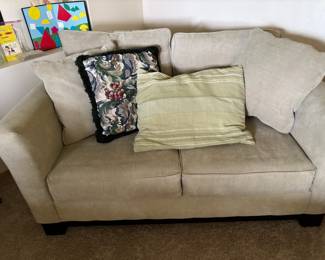 Tan Upholstered Loveseat