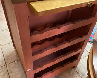 Kitchen Island back side with wine rack and cutting board