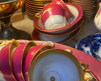 Antique set of fine china gold trim raspberry color no maker name