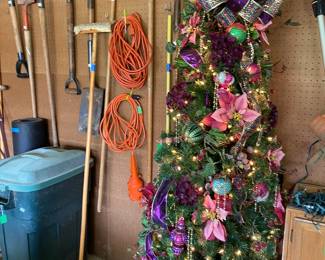 Fully decorated Christmas Tree and Yard Tools