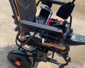 Electric Wheel Chair, ultra light, featherweight, never been used.