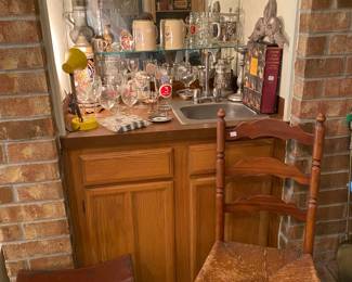 Bar Area with German Musical Beer Steins, Glass and Pewter Steins, Ladder Back Chair