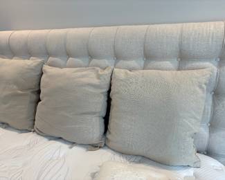 Natural Linen upholstered king bed - headboard padded with button detail, powerbase platform, and King Mattress available