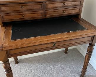 Early 19th century desk with pullout extension - leather top, center drawer and 4 drawer hutch (39" x 24" x 29")