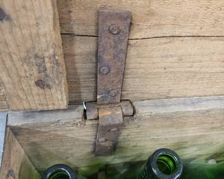Another view of hinge and bottles