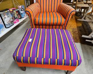 Orange striped arm chair with ottoman