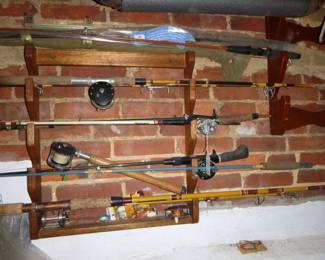 MANY FISHING RODS AND REELS