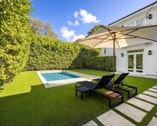 Tucci Umbrella + chaise lounges