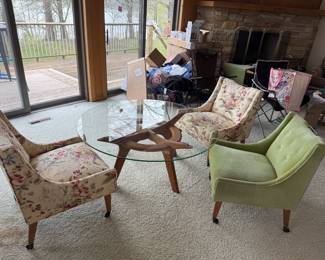 Available for presale
Low glass topped table with 4 chairs
Very MCM