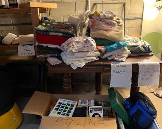 Books, towels, linens, table