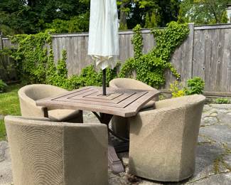 Outdoor Dining Table with Swivel Chairs. Photo 1 of 2.