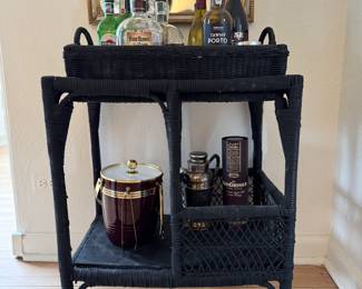 Ebonized Wicker Bar Cart on Casters. Measures 24" W x 16" D.