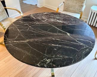 Mid-Century Marble Top Dining Table with Brass Base. Measures 47" D x 28" H with 27" Clearance. Photo 2 of 3.