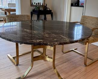 Mid-Century Marble Top Dining Table with Brass Base. Measures 47" D x 28" H with 27" Clearance. Photo 1 of 3.