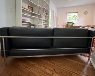 Pair of Le Corbusier LC2 Two Seat Sofa in Black Leather with Chrome Tube Steel Frames. Each Measures 62" W x 28" D x 27" H with 18" Seat Height. Photo 4 of 4.