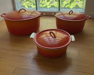 Vintage Belgium Orange Cast Iron Cookware. Photo 1 of 3.