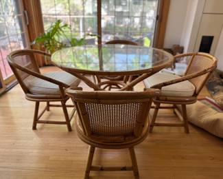 Ficks-Reed Mid-Century Bentwood Bamboo Dining Set with 4 Swivel Chairs. Chairs Measures 24" W x 25" D with 18" Seat Height. Table is 48.5" D x 26.5" H. Photo 2 of 3.