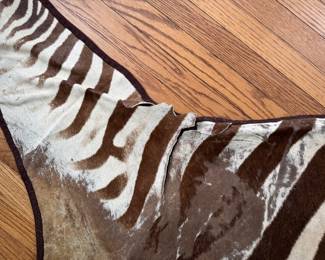 Zebra Hide Rug. Measures Approximately 8' x 6'. Photo 2 of 4.