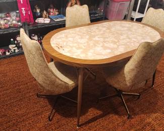 Awesome 1960's table and vinyl chairs